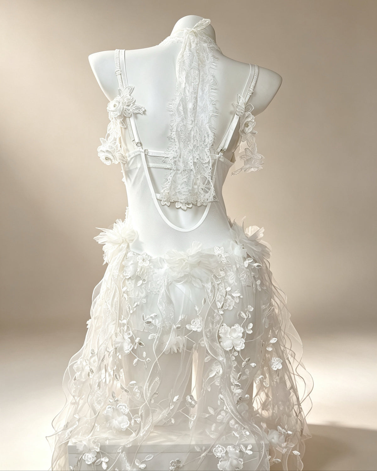 Vesper ivory embellished bodysuit with floral lace, crystal details and attached draped choker – back view | AVRY