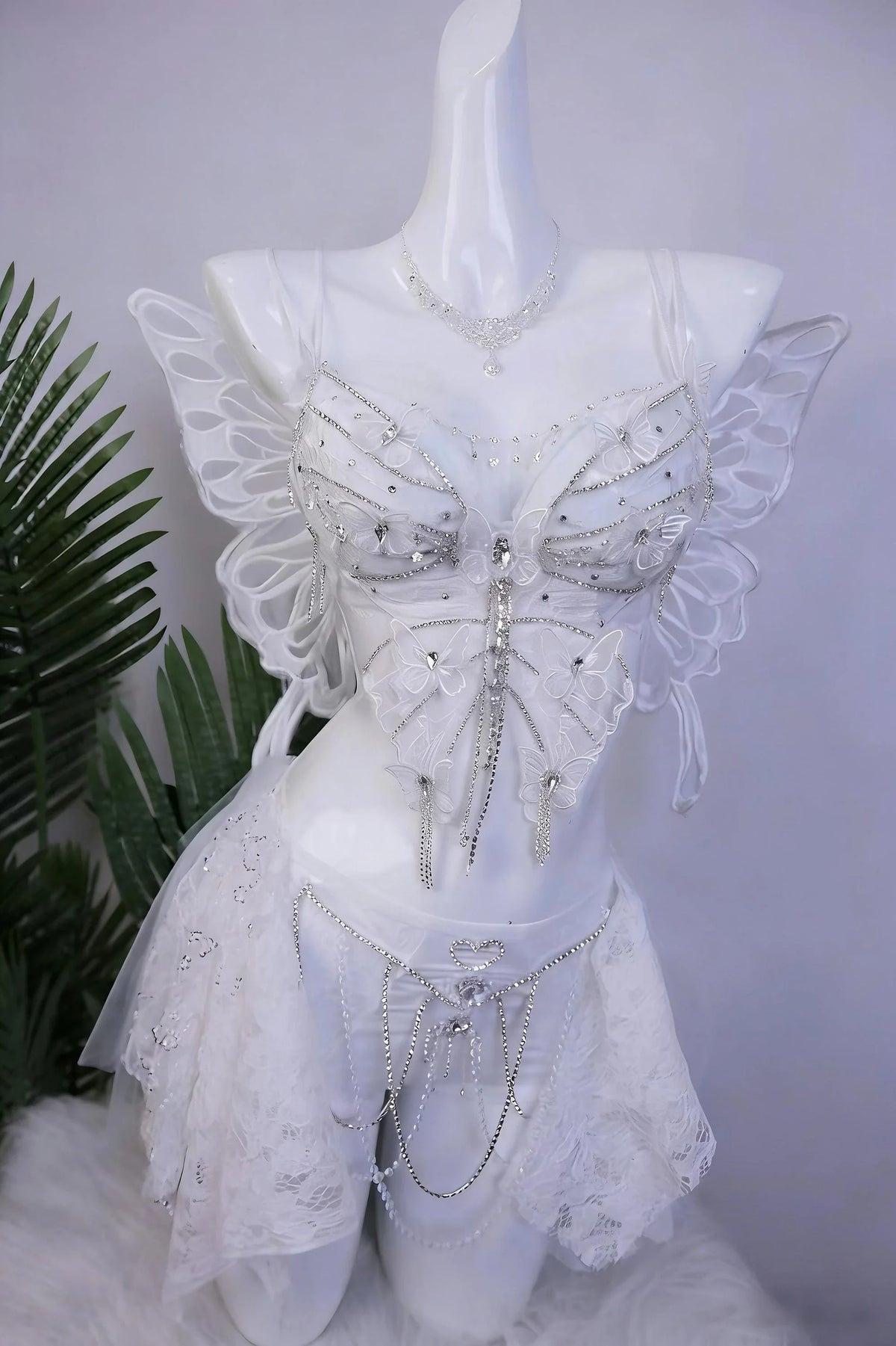 AVRY Lilac Morpho white fairy rave outfit with top, bottom, necklace and optional wings for ethereal festival styling.